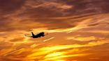 airplane in sunset