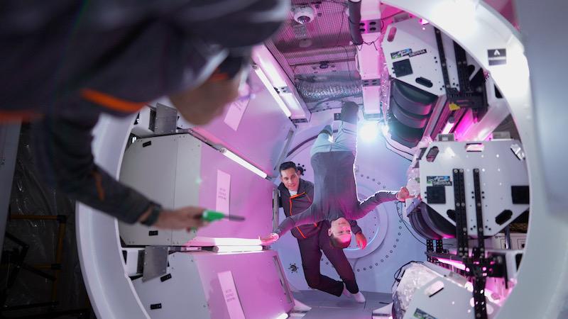 merck scientists in space floating around