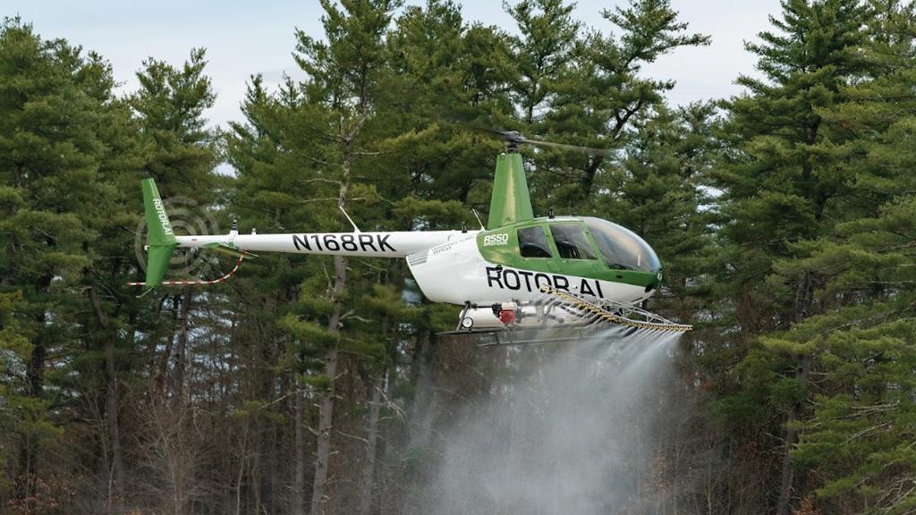 Rotor Technologies helicopter conducting crop dusting